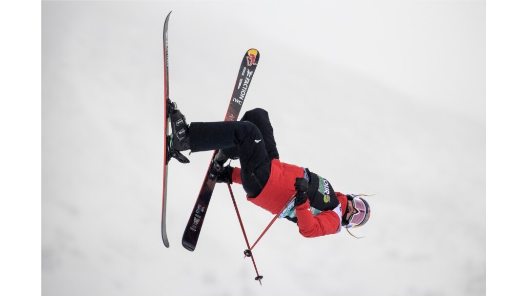 Eileen Gu, of China, makes a run in the slopestyle finals, Dec. 17, 2021, during the Dew Tour freestyle skiing event at Copper Mountain, Colo.