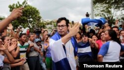Opposition leader Yubrank Suazo, who according to local media was arrested for participating in a protest against Nicaraguan President Daniel Ortega's government, dances after being released from La Modelo Prison, in Masaya