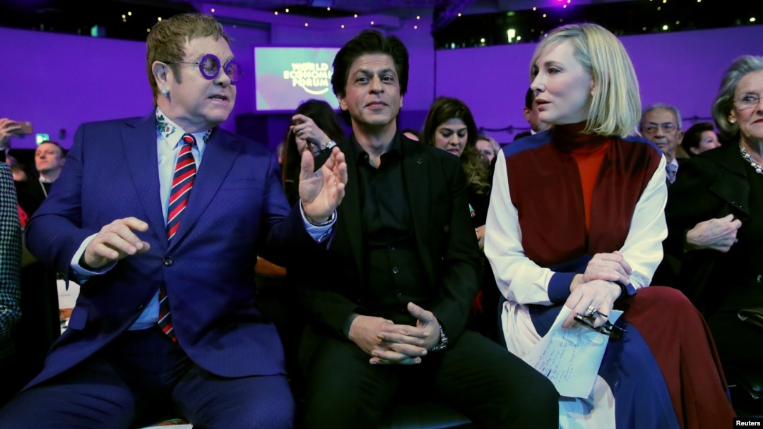 Actor Cate Blanchett, actor Shah Rukh Khan and singer Elton John are pictured at the Crystal Awards ceremony of the annual meeting of the World Economic Forum (WEF) in Davos, Switzerland, Jan. 22, 2018. 