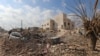 Destruction is seen around the Udai hospital following airstrikes on the town of Saraqeb in Syria's northwestern province of Idlib, Jan. 29, 2018. Syrian troops had been advancing on Idlib as part of a fierce offensive launched in late December with Russian backing.