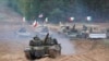Фото для ілюстрації: танки та бойові машини США, Італії, Канади та Польщі на навчаннях НАТО в Латвії, 2021 рік