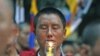 流亡印度的藏人举行抗议，他们说中国政府的严厉统治导致藏人自焚(2011年10月20号资料照)