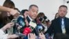 Taiwan Defense Minister Chiu Kuo-cheng speaks to reporters outside the National Defense Committee at Parliament in Taipei on Oct. 12, 2023. The initial lesson for Taiwan "is that intelligence work is very important," he said of the Israel-Hamas conflict.