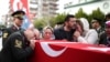 Family members mourn over the coffin of Ugur Palanci, 28, during a funeral ceremony in Izmir, Turkey, March 2, 2018. Taha Palanci was one of eight Turkish soldiers killed Thursday in fighting against Syrian Kurdish militia in Afrin, northwestern Syria.