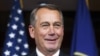 House Speaker John Boehner of Ohio smiles during a news conference on Capitol Hill in Washington, Nov. 6, 2014. 