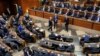 A Lebanese lawmaker, center, casts his vote to elect a new president, at the parliament building in downtown Beirut, Jan. 9, 2025. 