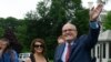 FILE - President Donald Trump's lawyer Rudy Giuliani speaks to reporter's on the South Lawn of the White House in Washington, May 30, 2018. 