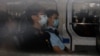 2020年10月29日, 前香港青年學生組織“學生動源”召集人鍾翰林在被警察押送到西九龍裁判法院