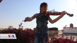 Çîroka Du Zarokên Efrînî yên Hunerhez li Kampên Penaberîyê
