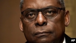Secretary of Defense nominee Lloyd Austin, a recently retired Army general, attends his confirmation hearing before the Senate Armed Services Committee on Capitol Hill, January 19, 2021, in Washington. 