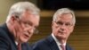 The EU chief Brexit negotiator Michel Barnier, right, and British Secretary of State David Davis address the media at EU headquarters in Brussels, July 20, 2017.