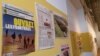 Reports in newspapers describe Europe's current migrant crisis. (L. Bryant/VOA)