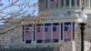 Flags are hung on the U.S. Capitol building in Washington, D.C., in preparation for Friday's inauguration of Donald Trump. 