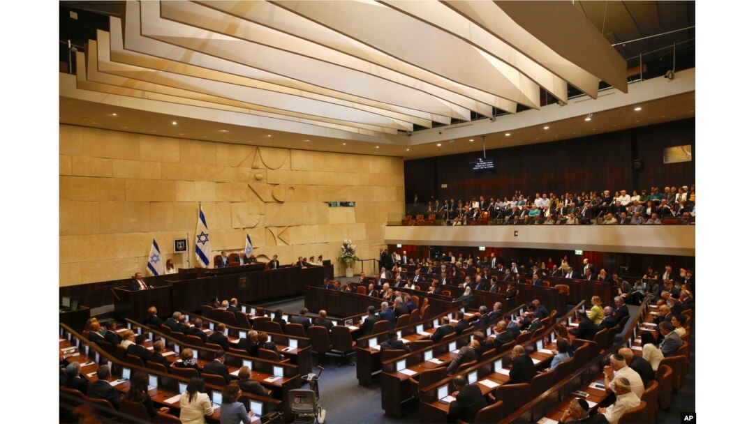 Members of Israel's parliament are being sworn in at the Knesset, the country's legislature, April 30, 2019.