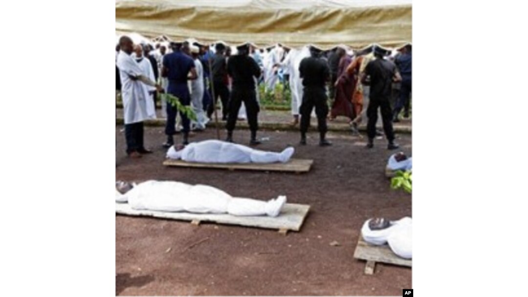 Bodies of people killed during a rally are seen at the capital's main mosque in Conakry, Guinea (Oct 2009 file photo)