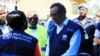 FILE - WHO chief Tedros Adhanom Ghebreyesus speaks to a health official in Beni, Democratic Republic of Congo, Aug. 10, 2018. The WHO has drawn criticism for its slow response to allegations of sexual abuse perpetrated by its own staffers in the country.