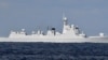 日本海上自衛隊拍攝的中國一艘軍艦2021年10月18日通過津輕海峽的情景。（路透社圖片）