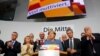 Christian Democratic Union CDU party leader and German Chancellor Angela Merkel reacts on first exit polls in the German general election (Bundestagswahl) in Berlin, Sept. 24, 2017. 
