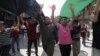 Syrians hold anti-government protest in Aleppo, Syria, July 27, 2012.