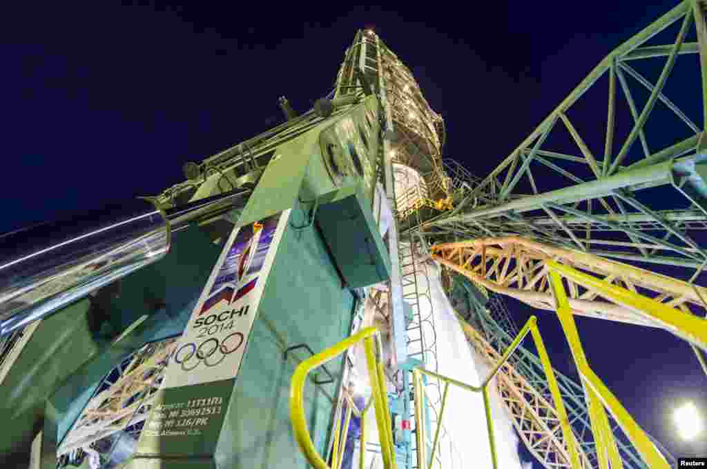 The Soyuz TMA-11M spacecraft, emblazoned with the Sochi 2014 logo and a blue-and-white snowflake pattern, is seen before blast-off at the Baikonur cosmodrome Nov. 7, 2013.