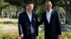 President Barack Obama stands with Chinese President Xi Jinping at the Annenberg Retreat at Sunnylands as they meet for talks in Rancho Mirage, California, June 7, 2013.