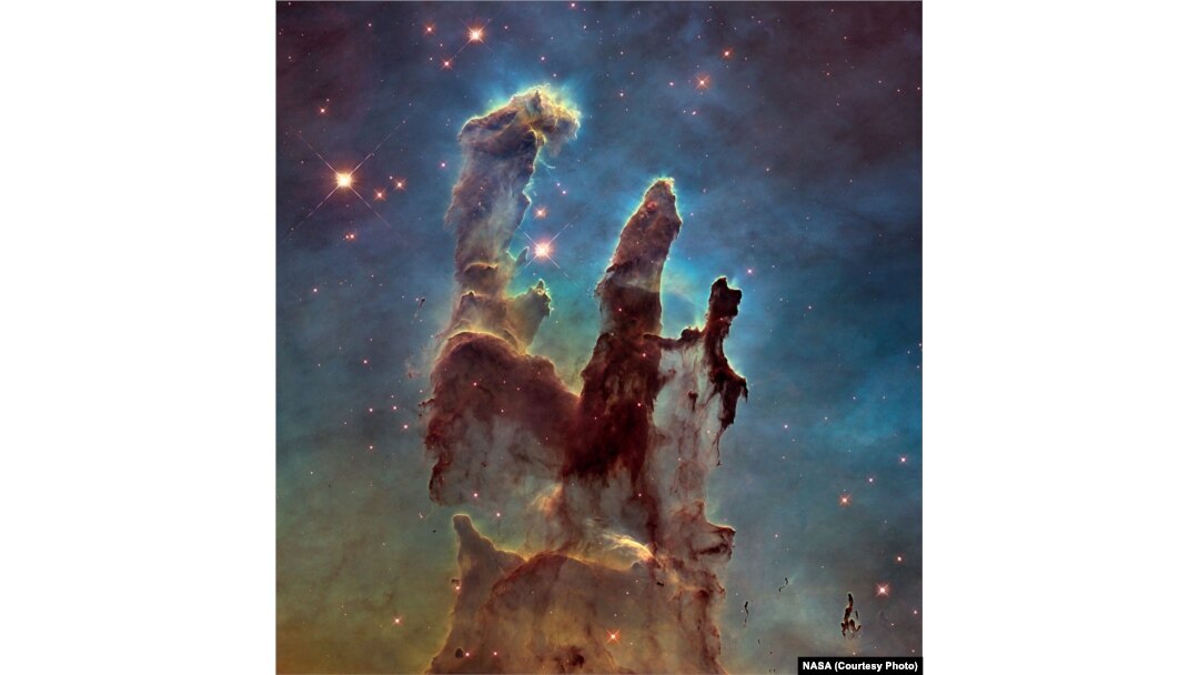 These towers of gas and dust in the Eagle Nebula are known as the Pillars of Creation because within them, hundreds of new stars are being created.