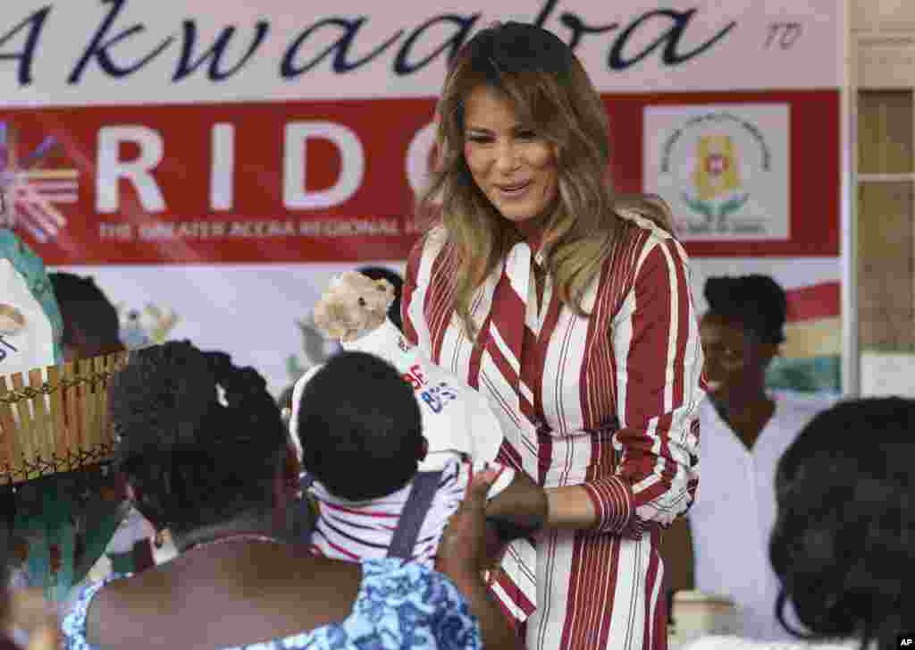 First lady Melania Trump hands out "Be Best" teddy bears to mothers and their babies at the Greater Accra Regional Hospital in Accra, Ghana, Oct. 2, 2018.