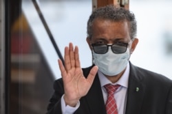 World Health Organization (WHO) Director-General Tedros Adhanom Ghebreyesus wears a protective face mask after leaving a ceremony for the restarting of Geneva's landmark fountain, following the COVID-19 outbreak, in Geneva, June 11, 2020.