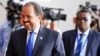 FILE - Somalia's President Hassan Sheikh Mohamud (l), October 12, 2013. 