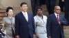 South Africa's President Jacob Zuma (R) wife Bongi Ngema (2nd R) welcome China's President Xi Jinping (2nd L) and wife Peng Liyuan for a working visit to South Africa, in Pretoria March 26, 2013.