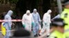 Forensic police investigate an area in the London Bridge area of London, June 5, 2017.
