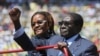 Zimbabwe President Robert Mugabe and his wife Grace arrive for his inauguration as President, in Harare, August 22, 2013. 