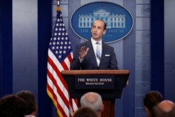 FILE - White House senior policy adviser Stephen Miller discusses U.S. immigration policy at the daily press briefing at the White House in Washington, Aug. 2, 2017.