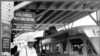 A sign in a bus station in Durham, N.C. points the way to a segregated waiting room