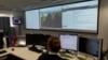 FILE - A naval officer works at the operation room of the EU NAVFOR, the European Union naval force responsible with anti-piracy patrols, at their headquarters in Northwood, England.