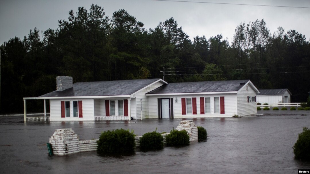 A house is seen flooded by rain after Hurricane Florence swept through the town of Wallace, North Carolina, Sept. 15, 2018. 