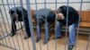 Tamerlan Eskerkhanov, Shagid Gubashev and Ramzan Bakhayev (L to R), detained over the killing of Boris Nemtsov