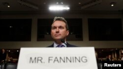 FILE - Eric Fanning takes his seat to testify before a Senate Armed Services Committee confirmation hearing on his nomination to be secretary of the Army on Capitol Hill in Washington, Jan. 21, 2016.