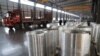China's factory activity picks up but trade uncertainties weigh