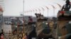 FILE - Amphibious assault vehicles of the South Korean Marine Corps travel during a military exercise as a part of the annual joint military training called Foal Eagle between South Korea and the U.S. in Pohang, South Korea, April 5, 2018. 