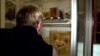 A visitor to the National Museum of Health and Medicine looks at one of the more bizarre artifacts housed in the collection - conjoined twins - in Silver Spring, Maryland, August 2012.