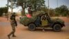 French soldiers stand at a crossroads as they arrive in the city of Sevare, about 620 kilometers north of Bamako, Mali, January 25, 2013.