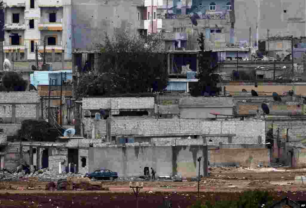 Kurd jangchilari shaharni "Islomiy davlat"dan tortib olishga urinmoqda, 16-oktabr, 2014-yil.
