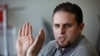 Former Guantanamo detainee and al-Qaida trainee Mourad Benchellali talks during an interview with the Associated Press in Gennevilliers, suburban Paris, France, May 13, 2015.