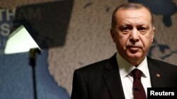 The President of Turkey, Recep Tayyip Erdogan, speaks at Chatham House in central London, Britain May 14, 2018. 
