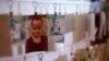 Photographs of child victims are displayed at the Kigali Memorial Center which documents the 1994 genocide, in Kigali, Rwanda, Feb. 19, 2008.