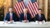 Ông Eric Frederick Trump (trái) và ông Đặng Thành Tâm (phải), Chủ tịch KBC, tại lễ ký kết hợp tác giữa Trump Organization và Tập đoàn Đầu tư Hưng Yên, dưới sự chứng kiến của cựu Tổng thống Donald Trump (giữa), tại New York, Mỹ, vào ngày 25/9/2024.