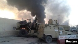 Iroq harbiylarining hujumga uchragan texnikasi, Mosul, 10-iyun, 2014-yil.