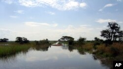 FILE - Magoro Town, Katakwi District. Magoro, Uganda, completely cut off from the rest of the district by flood water, Sept. 19, 2007. 