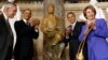 U.S. President Barack Obama (C) applauds after the unveiling of the Rosa Parks statue in the U.S. Capitol in Washington, Feb. 27, 2013. 